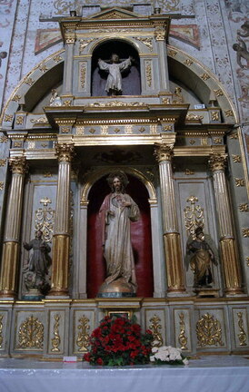 Imágen del Santo Niño en el Altar del Sagrado Corazón de la Basílica Menor de María Auxiliadora de Sevilla