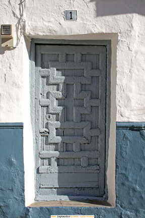 07 de Octubre 2006, Versos escritos en cal, Puerta.