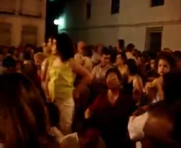 Instantánea de la tradicional "puja" en el Pretil de la Iglesia. 2 de Septiembre de 2006